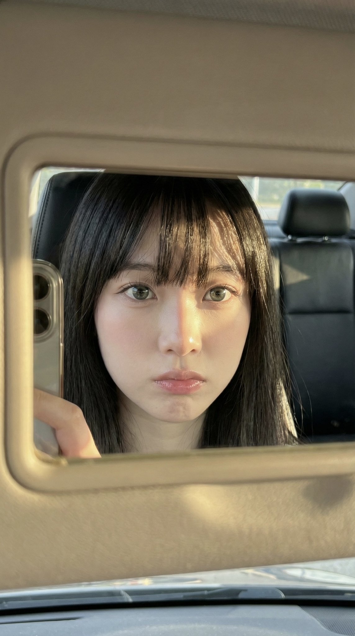 AI-generated Car Mirror iPhone Selfie made with Nano Banana Pro