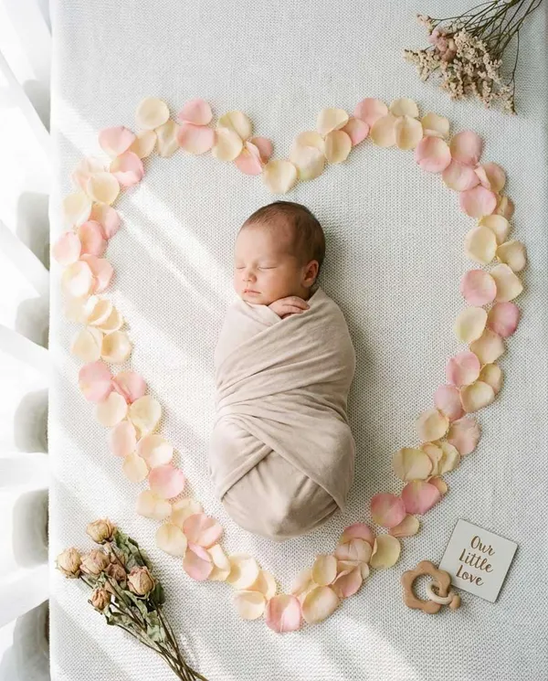 AI-generated Baby Portrait with Rose Petals made with Nano Banana Pro